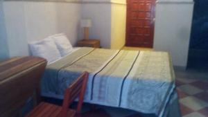 Postel nebo postele na pokoji v ubytování Yucatan Vista Inn Guest House