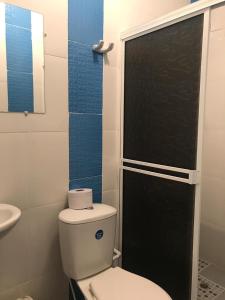 Koupelna v ubytování Hotel Maxim