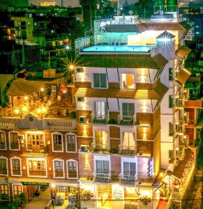 a view of a building at night with lights at Beautiful Kathmandu Hotel in Kathmandu