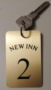 Plano de New Inn Residence