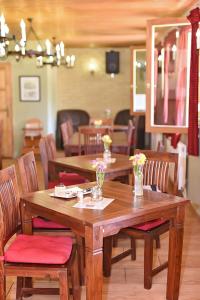 Posezení v ubytování Sirocave barlang apartmanok + 29 fotografií