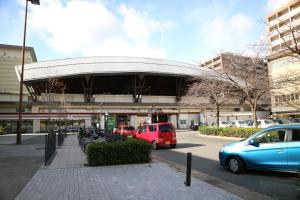 a red van parked in front of a building at Usaginonedoko in Kyoto