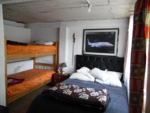 Postel nebo postele na pokoji v ubytování Cabañas Mirador de Soledad