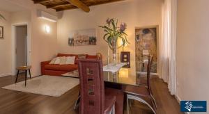 Ένα ή περισσότερα κρεβάτια σε δωμάτιο στο L'Olimpo di Estia