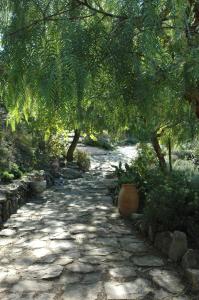 A garden outside Relais La Placa