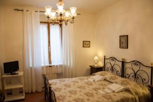 Cama o camas de una habitación en Locanda Il Pino