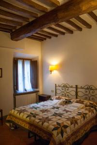 Cama o camas de una habitación en Locanda Il Pino