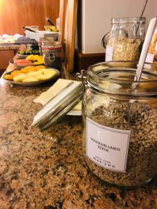 a jar of food sitting on top of a counter at Hotel Garni Max Zwo in Dingolfing