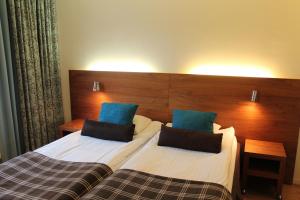 Letto o letti in una camera di Hotell Åsen