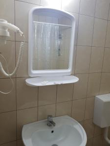 Koupelna v ubytování Hotel Dacor