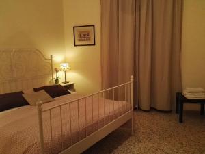 Postel nebo postele na pokoji v ubytování Luna Piena B&B