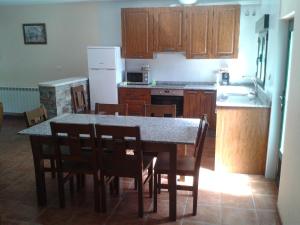 Kuchyň nebo kuchyňský kout v ubytování Casa Rosi. Cumbres borrascosas Brañuelas