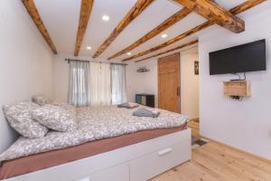 Кровать или кровати в номере New Serdika Apartment