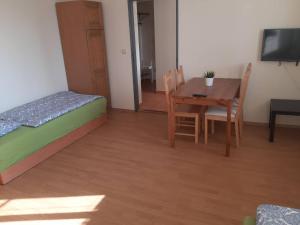 Postel nebo postele na pokoji v ubytování Penzion V Zatáčce