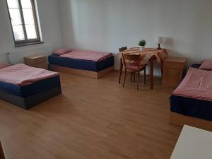 Postel nebo postele na pokoji v ubytování Penzion V Zatáčce