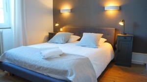 Letto o letti in una camera di Hotel Savel