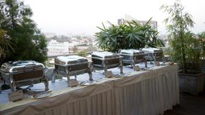 a table with four drums on top of it at Springs Hotels and Spa in Bengaluru