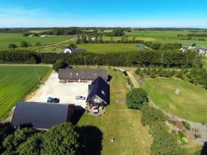 an aerial view of a farm with a barn at Give Bed & Breakfast in Give