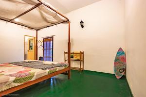 Tempat tidur dalam kamar di Dorian Guest House and Restaurant