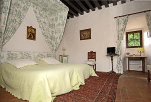 Postel nebo postele na pokoji v ubytování Château du Max