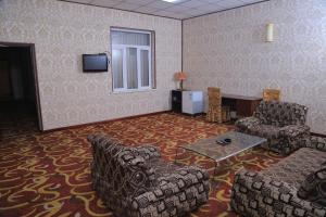 Llit o llits en una habitació de Dangara Hotel