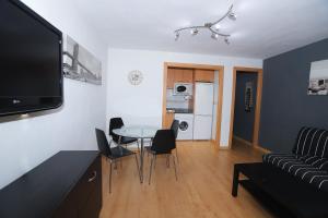 A television and/or entertainment center at DIFFERENTFLATS Sama