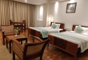 Postel nebo postele na pokoji v ubytování Grand Hotel + 17 fotografií