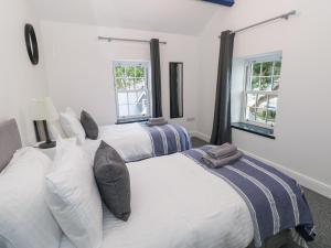 Ένα ή περισσότερα κρεβάτια σε δωμάτιο στο The Shell at the Hideaway +16 φωτογραφίες