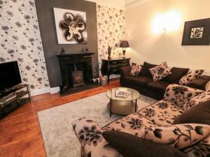 Ruang duduk di Sneaton Hall Apartment 4 +9 gambar
