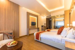 Letto o letti in una camera di Landmark Kathmandu