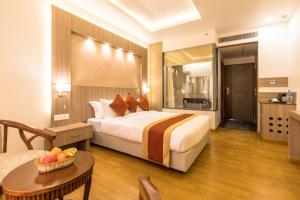 Letto o letti in una camera di Landmark Kathmandu