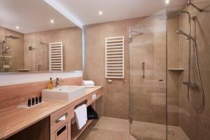 Ein Badezimmer in der Unterkunft HYPERION Hotel Berlin