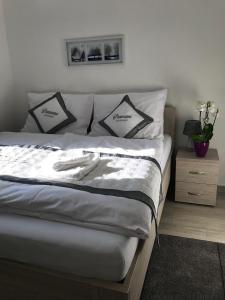 Posteľ alebo postele v izbe v ubytovaní Panorama Apartments