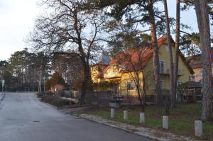 a house on the side of a street at Lívia Apartman in Balatonfüred +17 photos