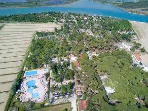 an aerial view of a park next to a lake at Camping Laguna Village in Caorle
