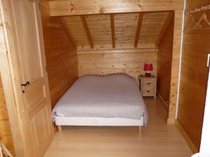 Ένα ή περισσότερα κρεβάτια σε δωμάτιο στο Chalet Les Sapins Argentés