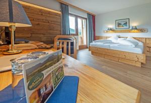 Letto o letti in una camera di Wiesenhof, Hotel direkt am See