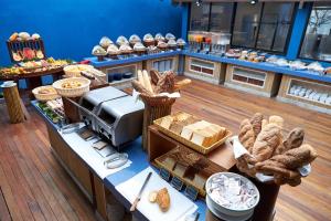 an overhead view of a bakery with bread and pastries at Bandara Spa Resort & Pool Villas, Samui in Bophut