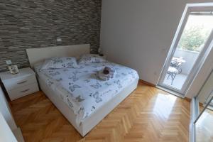 Postel nebo postele na pokoji v ubytování Apartment Ivan
