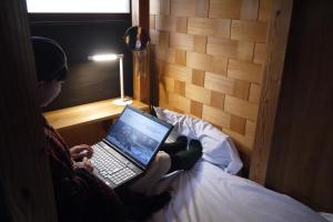 Postel nebo postele na pokoji v ubytování Hostel & Tatami Bar Uchikobare -内子晴れ-