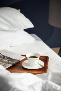 Ein Bett oder Betten in einem Zimmer der Unterkunft The Quarter Ladprao by UHG
