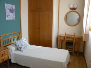 Rúm í herbergi á Hotel Nice