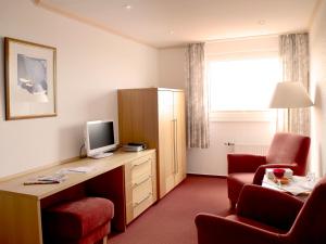 TV a/nebo společenská místnost v ubytování Hotel-Pension Peterhof