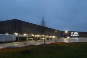 a large building with a sign on the side of it at Chez Karinette in Les Rivières-Henruel