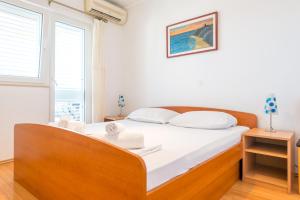 Posteľ alebo postele v izbe v ubytovaní Apartment Miha Marusic