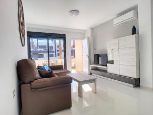 Televízia a/alebo spoločenská miestnosť v ubytovaní Playa Elisa Apartment - Mil Palmeras - 1510