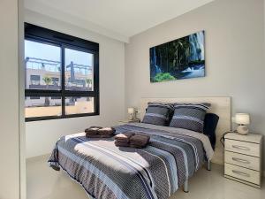 Posteľ alebo postele v izbe v ubytovaní Playa Elisa Apartment - Mil Palmeras - 1510