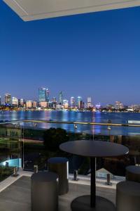 a view from a balcony overlooking a city at Quest South Perth Foreshore in Perth