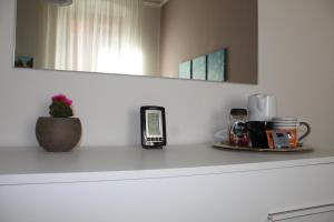 Příslušenství pro přípravu čaje a kávy v ubytování Big Central Room + 9 fotografií