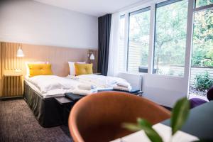 Letto o letti in una camera di Comwell Holte